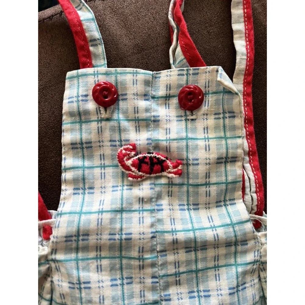 Vintage 1970s baby doll romper. Blue and white plaid.